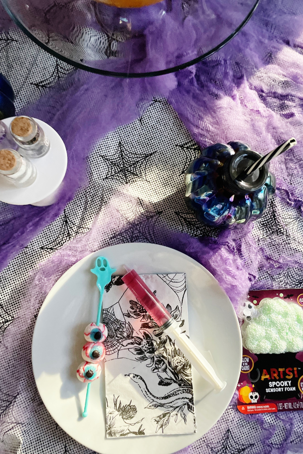 With all three Halloween table settings, each includes a small activity to keep the kids engaged.