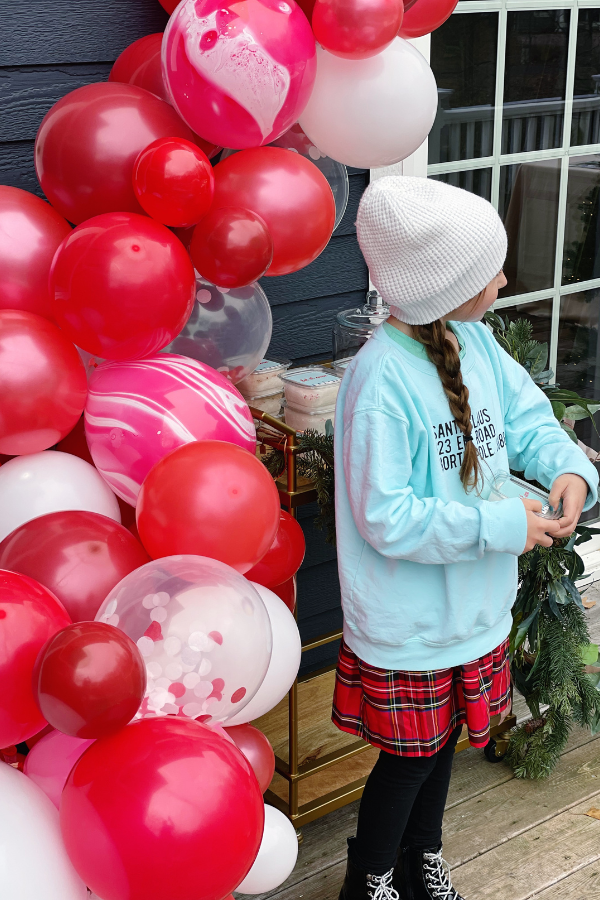 Looking for a unique birthday party theme for kids with winter birthdays? Check out this colorful winter wonderland party! This post is packed with ideas for decorations, a creative cake alternative, fun activities, tasty treats and cozy favors.