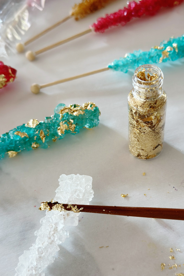 Transform rock candy into gem-inspired jewelry for a "She's a Gem" party. These candies make great treats and fantastic party favors for a gem-themed event.