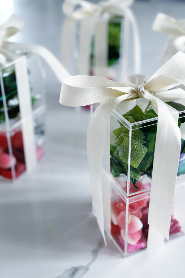 DIY candy box gift party favors with pink and green candies for gifts ideas.