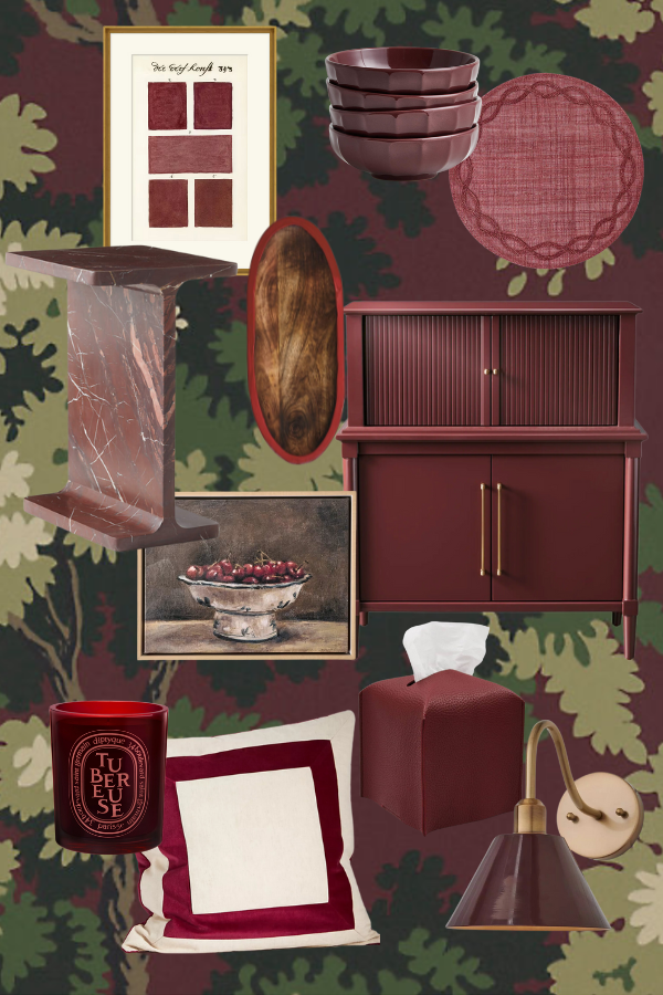 A curated collection of cherry-coded home accents, featuring a rich maroon and burgundy color palette. The collage includes a deep red cabinet with fluted doors, a marble side table, and decorative bowls. A framed red swatch art print and a cherry-inspired still-life painting. Other items include a velvet throw pillow, a dark red tissue box cover, a candle, a wood serving tray, and a burgundy wall sconce, all set against a leafy, vintage-inspired wallpaper. Perfect for embracing the latest design trend in a bold yet timeless way.